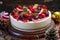 Cake with strawberry topping, blackberries with