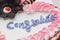 Cake top decoration with text congratulations