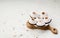 Cake, white-pink marshmallows, jam, cookies, chocolate on a blackboard, light background. Close-up. Place for text