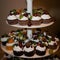 Cakes with cream and decorated fruit, berries, mint