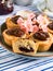 Cakes with frangipane, cherry jam and chocolate