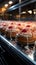 Cakes glide along automated conveyor, a sweet sight in bakery