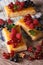 Cakes with raspberries, currants, honey and mint closeup. vertic