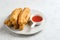 Cakwe or Cakue or Youtiao is traditional Chinese snack, long golden-brown deep-fried strip of dough.