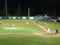 Cal State Northridge pitcher throws ball to UH Baseball players