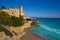 Cala La Jovera beach under Tamarit castle