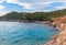 Cala Salada and Saladeta in san Antonio Abad at Balearic Islands Spain. Typical house for fishing boats and rocks.