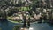 Calabasas luxury houses beside lake in wealthy neighborhood, aerial view