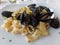 Calamarata pasta with squid rings and mussels