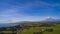 The Calbuco volcano erupting and the Osorno volcano on the left