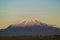 Calbuco volcano with golden light on its snowy top