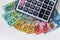 Calculator with colorful australian dollars on wooden table