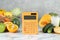 Calculator and food products on white marble table. Weight loss concept