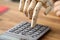 Calculator on wooden desk