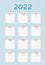 Calendar for 2022 from January to December, Chinese language. Every month is on squared paper with dots, piece of newspaper is at