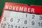 Calendar 2023, November, monthly planner for wall and desk. Close up of month and fist few days.