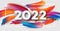 Calendar header 2022 number on colorful abstract color paint brush strokes background. Happy 2022 new year colorful