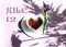 Calendar for July 12: the name of the month of July in English, the numbers 12, a cup of tea in the shape of a heart, an iris