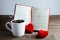 Calendar memo, notebook with the red Heart pillow, coffee cup