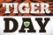 Calendar with Striped Label and Green Shield for Tiger Day, Vector Illustration