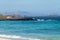 Caleta del bajo, corralejo grandes playas white sandy beach with blue water near Corralejo touristic town on north of