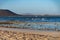 Caleta del bajo, corralejo grandes playas white sandy beach with blue water near Corralejo touristic town on north of