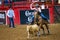 Calf roping competition in the Stockyards Championship Rodeo