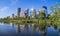 Calgary skyline reflected in a wetland