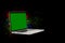 Calibration of laptop screen, monitor color, tablet or laptop. Modern laptop isolated on black with green screen. Multi