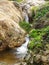 California Coastal Rocks and Cliffs, small cascading waterfall along the coast - Road Trip down Highway 1