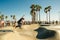 California, Los Angeles - june, 2019 Skater boy on the street in Los angeles. Skateboarding in venice beach