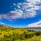 California meadows hill and lake in a blue sky spring