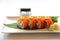 California rollsl sushi with egg cucumber avocado cream cheese red caviar Sushi menu. Japanese food. American style