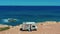 California, United States, JULY 20TH, 2019: Aerial view. Camper van on a parking lot on a rock near the sea. RV park.