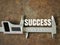 Calipers measuring with text SUCCESS.Motivational concept.