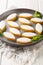 Calissons traditional French Provence sweets on a plate closeup. Vertical