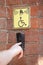 Call button for the disabled built-in wall marked yellow tablets