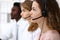 Call center operator.Young beautiful brunette woman in headset. Business concept