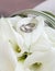 calla flowers with wedding rings