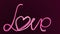 Calligraphy drawing love word by hand. Animation paintbrush write love at dark purple background. Phrase love with