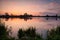 Calm autumn sunrise over wild lake