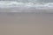 Calm background Wet clear Baltic sand
