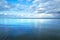 Calm Baltic sea with blue sky