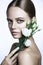 Calm Beauty Fashion Model Woman face. Portrait with white Rose flower.