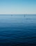 Calm Blue Pacific Ocean and Lazy Sailboats