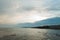 Calm blue sea with cliffs at sunset. Amazing seascape near the Spanish city of Malaga. Vacation. Europe-trip.