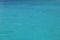 Calm blue / turquoise water surface for background - ocean