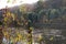 Calm canal with early autumn foliage on sides in Meppen Germany