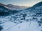 Calm and cosy fairy-tale village Kryvorivnia covered with snow in the Carpathians mountains, aerial view. Typical landscape in