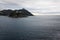 Calm empty sea in La Concha Bay of San Sebastian at sunset